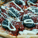 Red Velvet dessert pizza slice - Nutella base with red velvet cookie dough and cream cheese icing - Brother Bruno Direct
