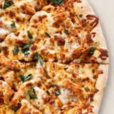 Close-up of Brother Bruno Penne Vodka Pizza with penne, homemade vodka sauce and browned mozzarella